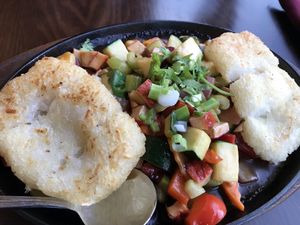 Sizzling rice plate at Roots in Louisville
