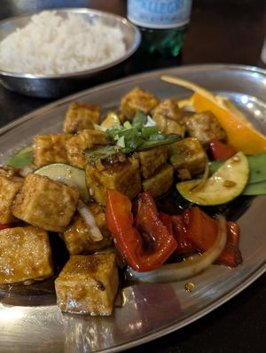 Orange tofu. excellent in house tofu made for this dish. I found myself really savoring each bite to maximize the experience. I'm going to miss this place when I head home. at Heart and Soy in Louisville