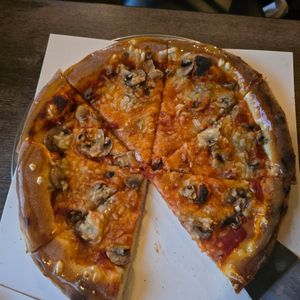 First pizza, mushroom vegan cheese. at Tawas Bay Pizza Company in Tawas City