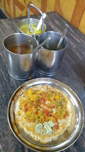 I ordered a tomato uttapam w/out onions, and indeed there were more tomatoes in it than I've eaten in three months in SL. at Akshathai in Jaffna