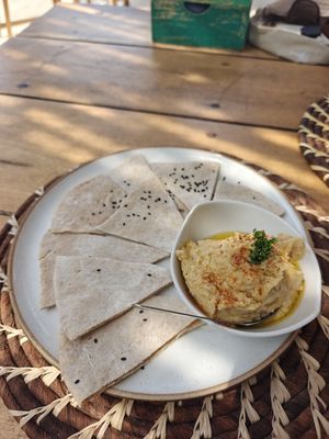 Hummus with pita bread at Dos Aguas Lodge in Rincon Del Mar