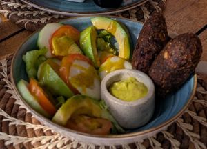Ensalada con croquetas at Dos Aguas Lodge in Rincon Del Mar