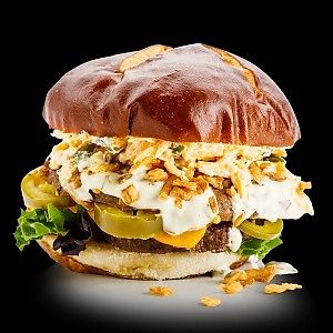 Poppin' Jalapeno Burger

two signature burger patties, plant-based cheddar, plant-based jalapeño pimento cheese, pickled jalapeños, crispy onions, mixed lettuce at Native Foods - The Loop in Chicago