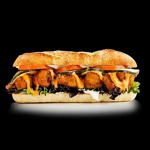 Cauliflower Po' Boy

Cajun-seasoned fried cauliflower, pickle chips, tomatoes, lettuce, creamy Cajun sauce, toasted French baguette, side of your choice at Native Foods - The Loop in Chicago