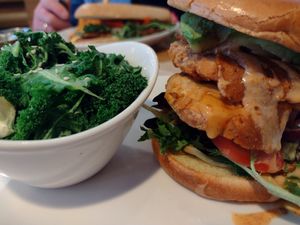 Chicken Bacon Avo club with side of kale. So much avocado you can't see under the bun! at Native Foods - The Loop in Chicago