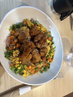 Orange cauliflower bowl😡 at Native Foods - The Loop in Chicago