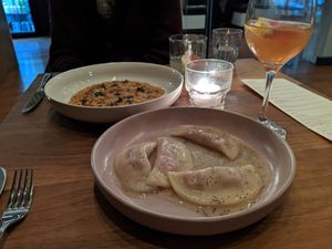 Beet stuffed "pasta" and risotto main courses at Osteria Du in Toronto