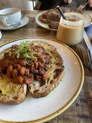 Bulgarian beans on sourdough with an iced coconut latte   at Fork & Flavour in Chester