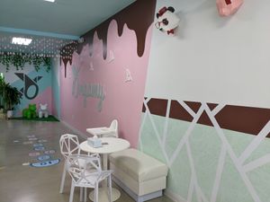Indoor seating and play area for children at Origamy Gelato in Sunrise