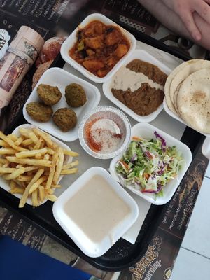 Falafel, chips, salad, curry, bean dip at El Gezawy in Giza