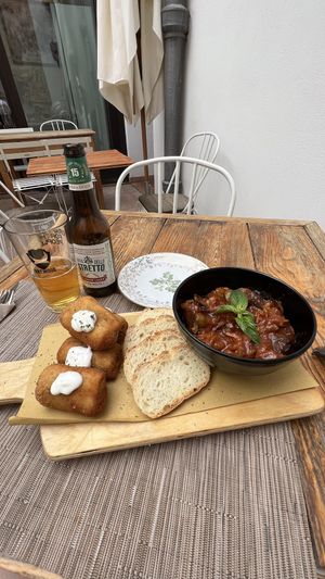 Caponata and mini rolls di capodanno  at aTipico in Palermo