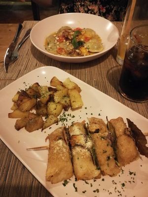 Involtini (front) ravioli (back) at aTipico in Palermo