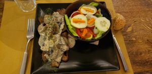Seitan in mushroom sauce, and side salad at aTipico in Palermo