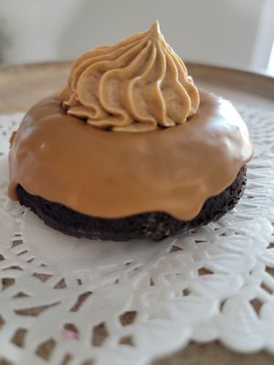 Vegan and gf Mocaccino donut ---Chocolate donut with coffee glaze and buttercream at The Sweet Vegan  in Lakeland