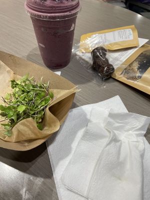 Avo toast, big E smoothie, power balls, tea and syrup packets!!  at Nourish u Wellness Cafe in Wapakoneta