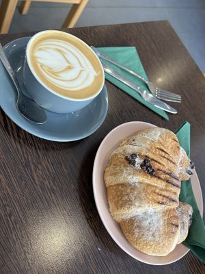 vegan chocolate croissant + oat milk latte   at Mayze - Dennistoun in Glasgow