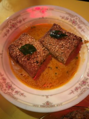 Sesame “prawn” toast with curry sauce   at Facing Heaven  in East London