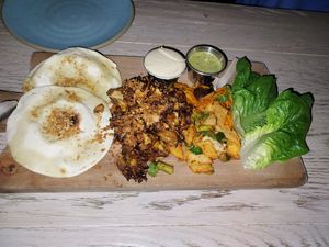 Maitake mushroom dish with humus and other sauce, Naan, veg. So good. at Girl & The Goat in Chicago