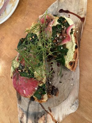 Seared turnip,edamame butter,radish, pomegranate molasses and sweet potato brioche   at Plant in Asheville