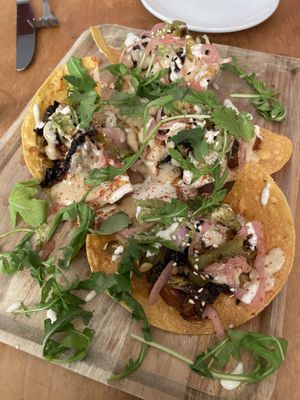 BBQ Brussels tostadas -vegan queso, guac, olives and arugula   at Plant in Asheville