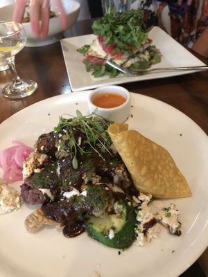 Mushroom mole with blue corn veggie tamale  at Plant in Asheville