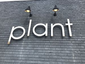Sign outside at Plant in Asheville