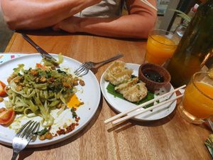 Half eaten GF pesto pasta and dumplings at Juju in 