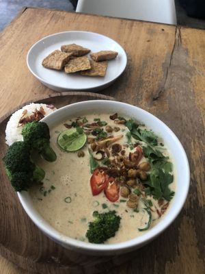 Yellow lentil curry + extra tempeh   at Juju in 