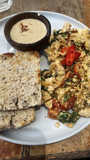 Scrambled tofu with cheeze sauce - pretty good, but the bread is not the best  at Juju in 