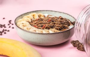 Yogurt bowl. 
Yogurt 2% fat, homemade chocolate granola, banana and peanutbutter. at Nutribowl in Thessaloniki