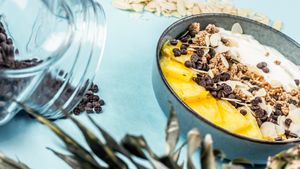 Yogurt bowl. 
Yogurt 2% fat, homemade cinamon granola, pineapple and chocolate drops at Nutribowl in Thessaloniki