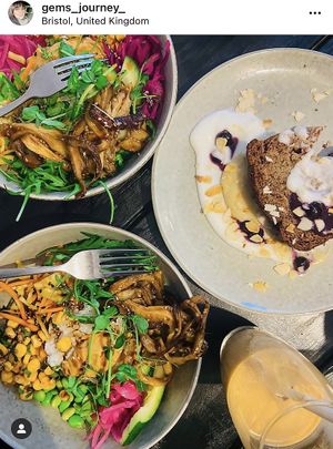 Vegan mushroom rice bowl with a side of banana bread😉 at Burra in Bristol