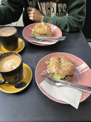Avocado & bean bagels with soy coffees  at Five Points in Melbourne