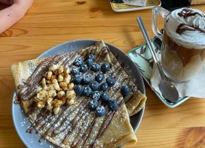Crepe with Peanuts, Blueberries & Nutella Topping / Nutella No Milk Latte  at Guará in Vila Nova De Gaia