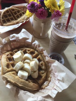 Vegan waffles, with peanut butter and banana and a regular one, with maple syrup. And banana/chocolate smoothie    at Bedrock Eats & Sweets in Memphis