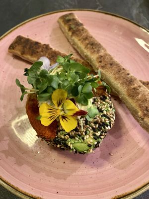 Avo garden: a halved avocado filled with hummus and served with pita sticks  at The Avocado Show in Leidschendam