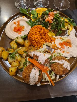 Couldn't wait to try...sorry demolished rice and parsley dish xxx at Le Socrate in Nice