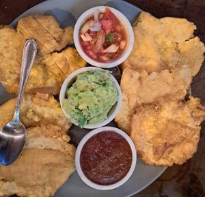 Patacones were excellent, guacamole, salsa, and beans all really fresh and delicious! at Kinsu in Uvita