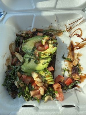 Half order avocado toast on pumpernickel bread…..to die for…..  at Steady Eddy's Cafe at the Market in Flint