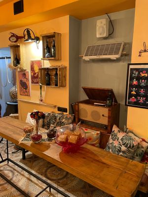 One of the tables in the cafe with cakes on display at Soul Kitchen Yerevan in Yerevan