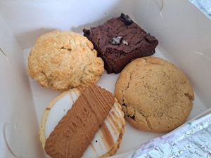 Scone (delicious!!!) Oreo brownie, biscoff empire and stuffed cookie. This was last time...today we got the raspberry and lemon empire deluxe and a slutty brownie , both incredible at Plant Blonde in Glasgow