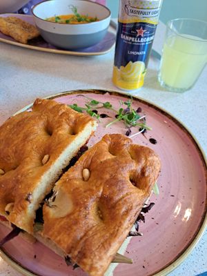 Focaccia sandwiches. (Sausage roll and soup in the background) at Plant Blonde in Glasgow
