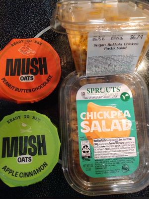 Vegan flavored overnight oats, chickpea salad, and vegan buffalo chicken pasta salad at Sprouts Farmers Market in Estero