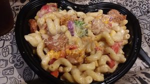 Custom mac bowl with Beyond Sausage, vegan cheese and veggies at I Heart Mac & Cheese in Naples
