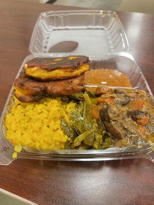 Fritters, Yellow rices, collard greens, jerk mushrooms, ginger seamoss dipping at Lively Up Icells in Stonecrest
