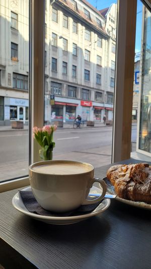 Oat latte and croissants with filling at Foxy's Bake Shop in Riga