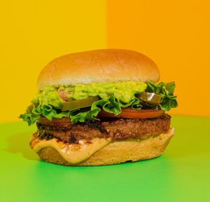 Holy Guacamole Burger: 1/4 lb plant-based patty, lettuce, tomato, jalapeño, guacamole, and chipotle sauce. | GFO/Spicy
 at Plant Power Fast Food in Hollywood