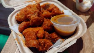 Another order of Buffalo cauliflower wings but it didn't have carrots/celery, ranch or sesame seeds even though ordered on same visit. at elephant + vine  in Evanston