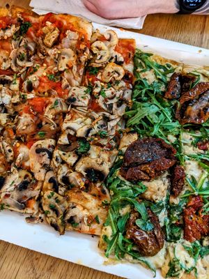 Vegan mushroom pizza and hummus & sun-dried tomato. Amazing! at La Prezzemolina in Rome