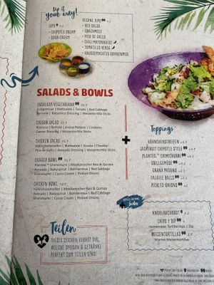 Vegane Speisen sind mit zwei Blättern gut gekennzeichnet.  at Enchilada in Hannover